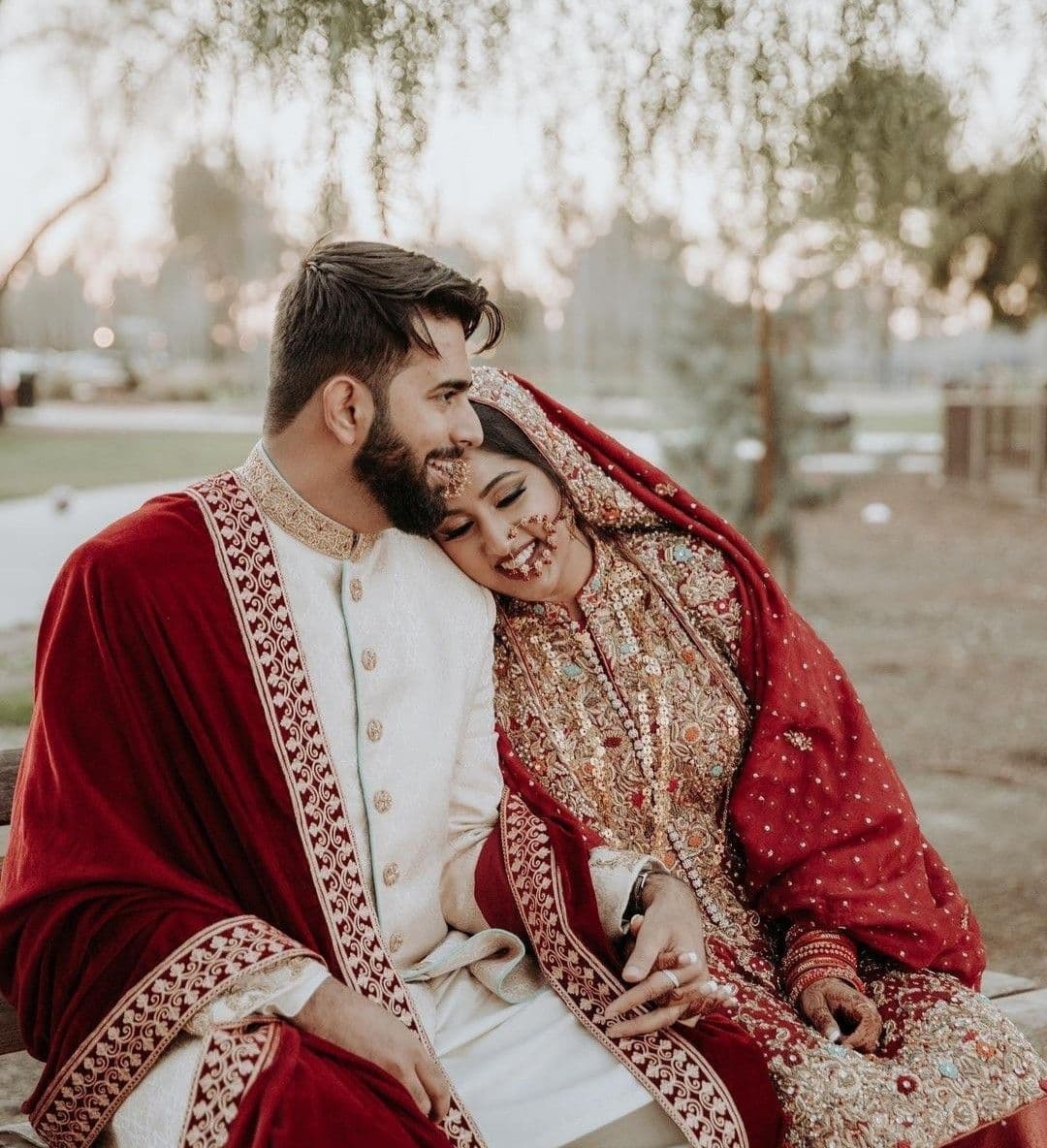 Pakistani bride in traditional red and gold dress